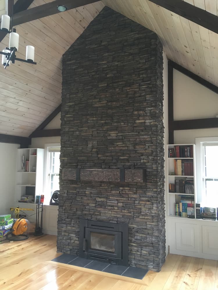 stone fireplace up to ceiling